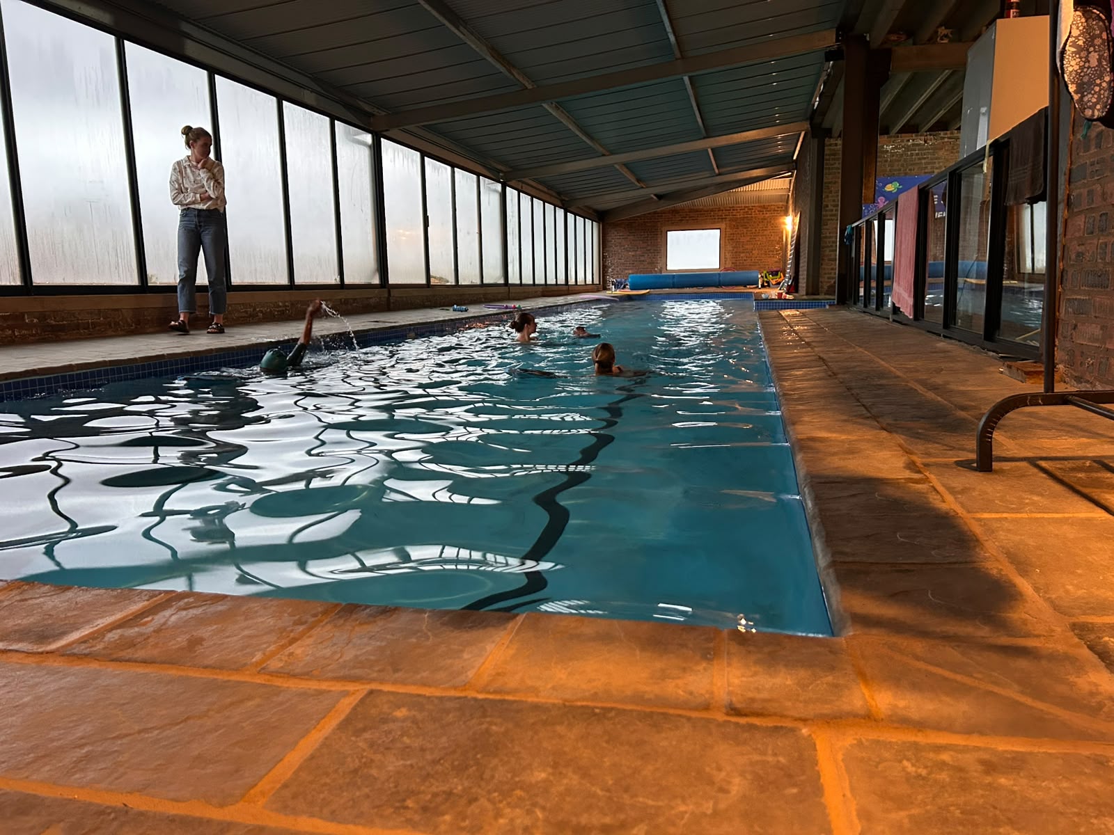 Golden-hour swim session in the indoor pool